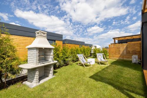 Imagen de la habitación del Viviendas Turísticas Vacacionales RResort - nowe domki z PODGRZEWANYM Basenem, WiFi, parking w cenie!. Foto 3