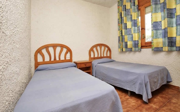 Imagen de la habitación del Viviendas Turísticas Vacacionales Rentalmar El Pinar Adosados. Foto 13