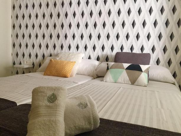 Imagen de la habitación del Viviendas Turísticas Vacacionales Roisa Suites. Foto 3