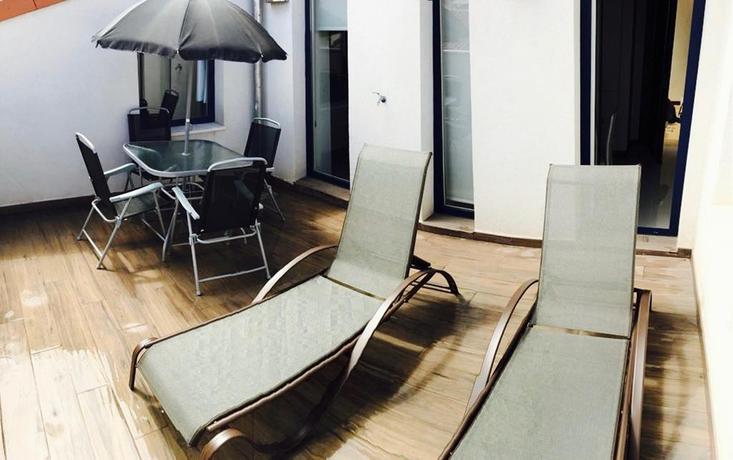 Imagen de la habitación del Viviendas Turísticas Vacacionales Roisa Suites. Foto 7