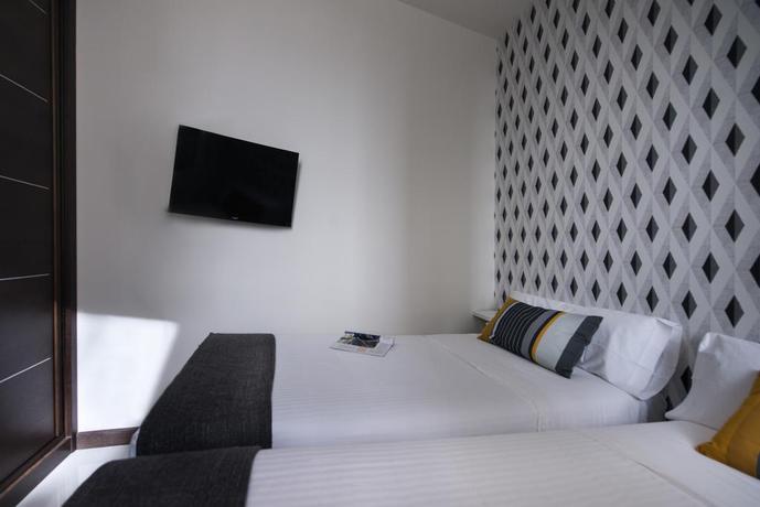 Imagen de la habitación del Viviendas Turísticas Vacacionales Roisa Suites. Foto 11