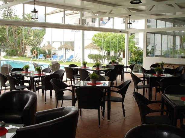 Imagen del bar/restaurante del Viviendas Turísticas Vacacionales Sierra Park Club. Foto 2