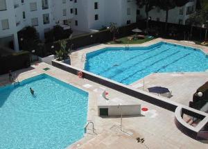 Imagen de la piscina del Viviendas Turísticas Vacacionales Sun and Life el Puerto. Foto 6