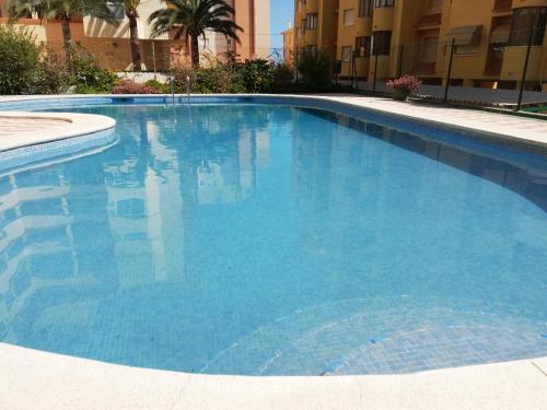 Imagen de la habitación del Viviendas Turísticas Vacacionales Tamaris Playa Solo Familias Serviplaya. Foto 10