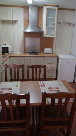 Imagen de la habitación del Viviendas Turísticas Vacacionales URH Apartments Vila de Tossa. Foto 7