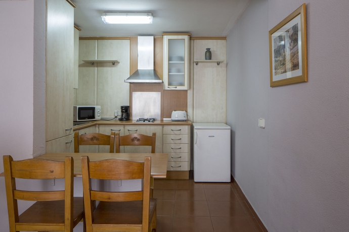 Imagen de la habitación del Viviendas Turísticas Vacacionales URH Apartments Vila de Tossa. Foto 13