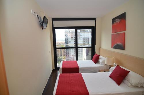 Imagen de la habitación del Viviendas Turísticas Vacacionales Valencia Rental. Foto 7