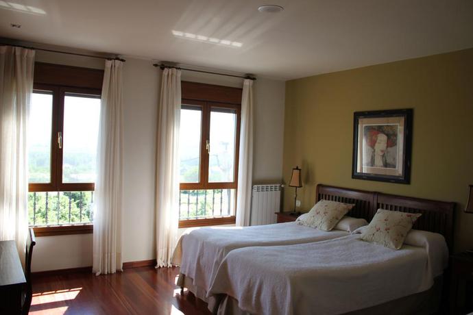 Imagen de la habitación del Viviendas Turísticas Vacacionales Villa Mencia. Foto 3