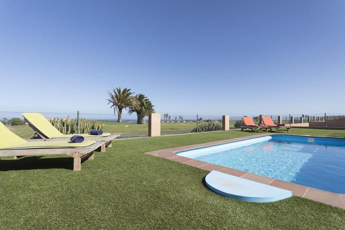 Imagen de la piscina del Viviendas Turísticas Vacacionales Villas Caleta Beach and Golf. Foto 11