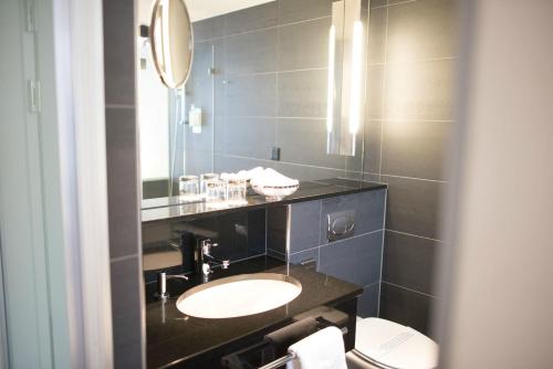 Habitación Individual Confort del hotel Glockenhof Zürich. Foto 1