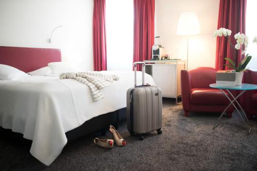 Habitación Doble Confort del hotel Glockenhof Zürich. Foto 1