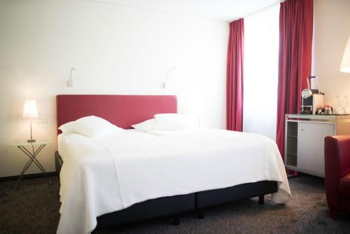 Habitación Doble Confort del hotel Glockenhof Zürich. Foto 2