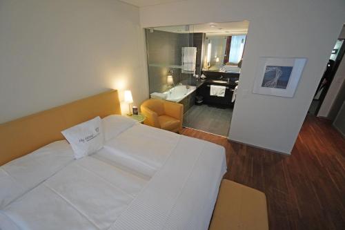 Habitación Doble Confort del hotel Glockenhof Zürich. Foto 4
