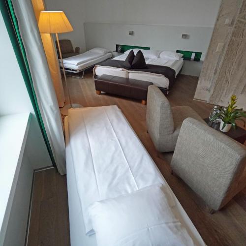 Habitación Familiar del hotel Glockenhof Zürich. Foto 1