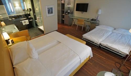 Habitación Familiar del hotel Glockenhof Zürich. Foto 3