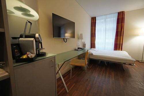 Habitación Familiar del hotel Glockenhof Zürich. Foto 4