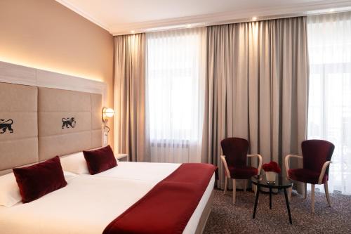 Habitación Deluxe con vistas superiores del hotel St Gotthard. Foto 1