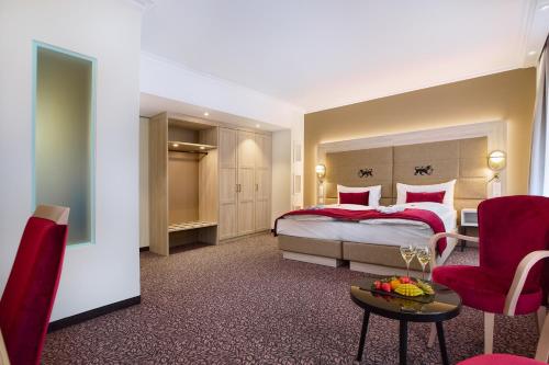 Habitación Doble Deluxe con Balcón del hotel St Gotthard. Foto 1
