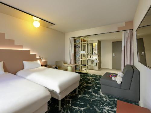 Habitación Estándar - 2 camas individuales y 1 sofá cama del hotel Ibis Styles Zurich City Center. Foto 5