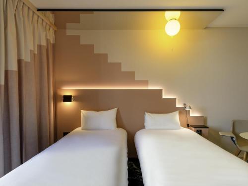 Habitación Doble Estándar - 2 camas del hotel Ibis Styles Zurich City Center. Foto 3