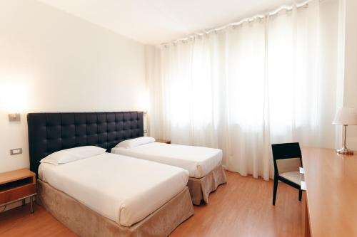 Habitación Doble - 2 camas del hotel Excelsior Bari. Foto 3