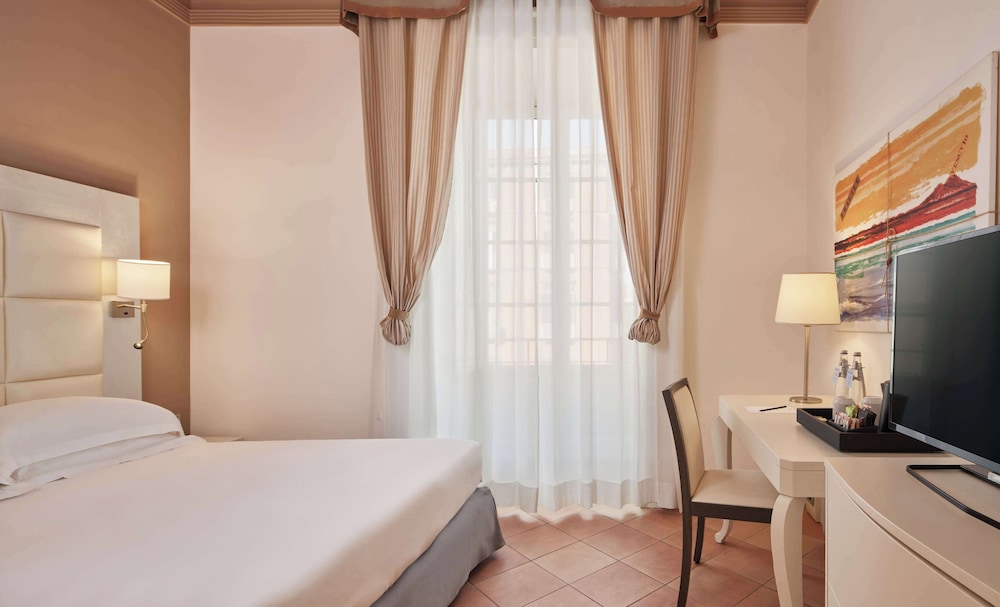 Habitación, 1 cama de matrimonio del hotel Palazzo Caracciolo Naples. Foto 5