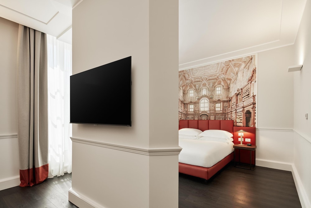 Junior suite 1 Cama queen Suite del hotel Palazzo Caracciolo Naples. Foto 1
