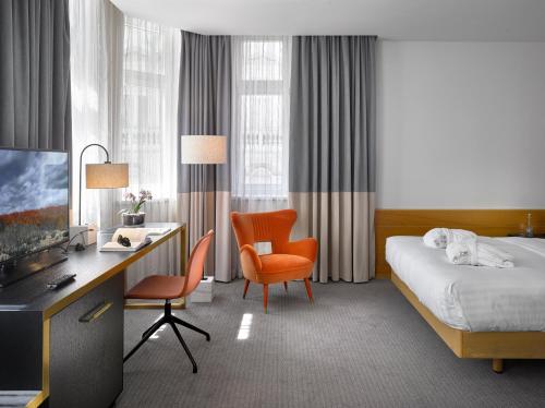 Habitación Superior Urbana del hotel K+k Fenix. Foto 1