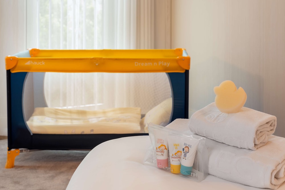 Habitación familiar, terraza del hotel Nh Collection Berlin Mitte Am Checkpoint Charlie. Foto 4