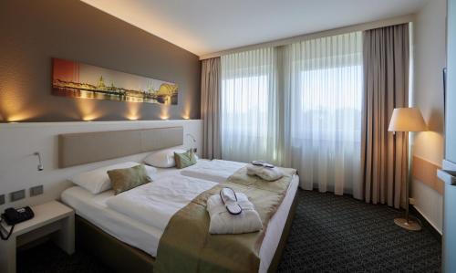 Suite Superior del hotel Mercure Hotel Severinshof Koeln City. Foto 4