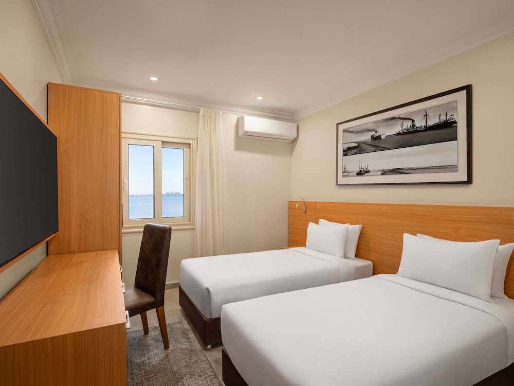 Habitación Estándar con 1 cama doble, lado jardín del hotel Mercure Ismailia Forsan Island. Foto 6