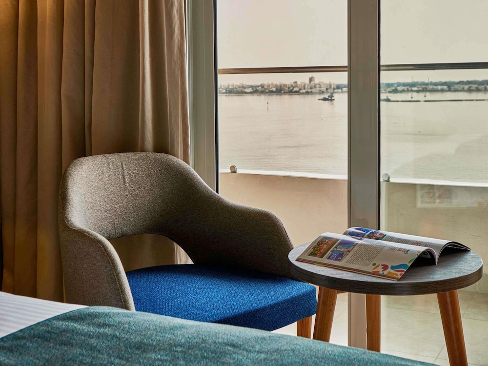 Habitación Privilege, balcón, vistas al lago - 2 camas individuales del hotel Mercure Ismailia Forsan Island. Foto 10
