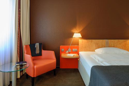 Superior Twin Room - Courtyard Side del hotel Mercure and Residenz Frankfurt Messe. Foto 1