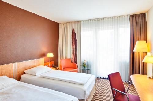 Superior Twin Room - Courtyard Side del hotel Mercure and Residenz Frankfurt Messe. Foto 3