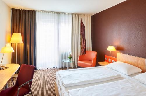 Habitación Doble Estándar del hotel Mercure and Residenz Frankfurt Messe. Foto 12