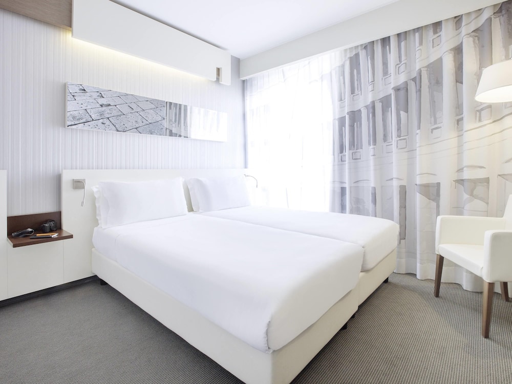 Habitación superior con 2 camas individuales, 2 camas individuales, balcón del hotel Ibis Styles Roma Eur