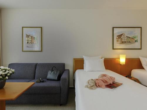 Habitación Doble Estándar - 2 camas del hotel Novotel Freiburg Am Konzerthaus. Foto 2