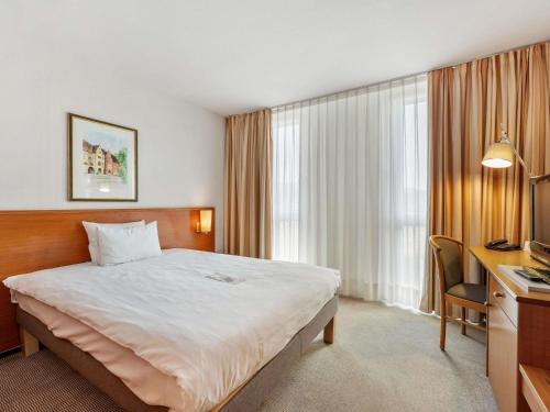 Habitación Estándar - 1 cama grande del hotel Novotel Freiburg Am Konzerthaus. Foto 3