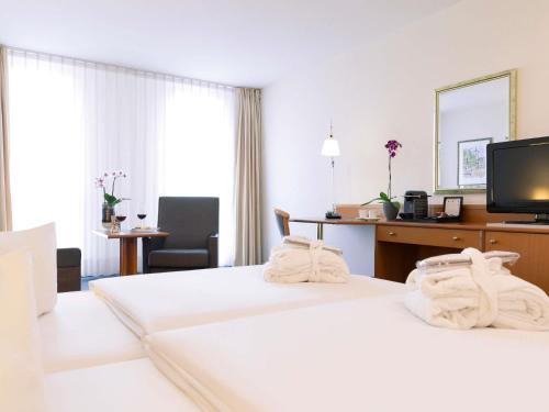 Habitación Estándar - 1 cama grande del hotel Novotel Freiburg Am Konzerthaus. Foto 4