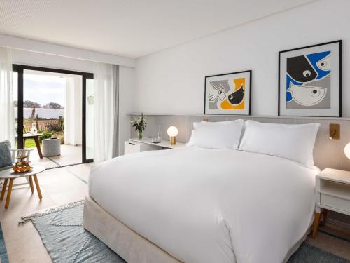 Habitación Deluxe, 1 cama queen - size y vistas al jardín del hotel Sofitel Agadir Thalassa Sea and Spa. Foto 1