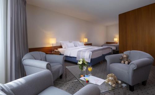 Habitación Familiar Estándar del hotel Maritim Airport Hannover. Foto 2