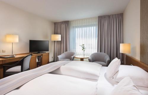 Habitación Familiar del hotel Maritim Airport Hannover. Foto 1