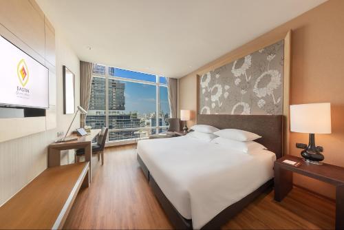 Habitación Executive Superior Doble con acceso al salón - 1 o 2 camas del hotel Eastin Grand Sathorn Bangkok. Foto 2