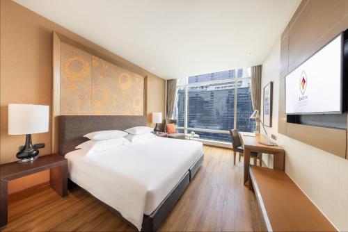 Habitación Doble Superior Sky - 1 o 2 camas del hotel Eastin Grand Sathorn Bangkok. Foto 1