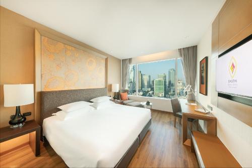 Habitación Superior Sky Mahanakhon del hotel Eastin Grand Sathorn Bangkok. Foto 1