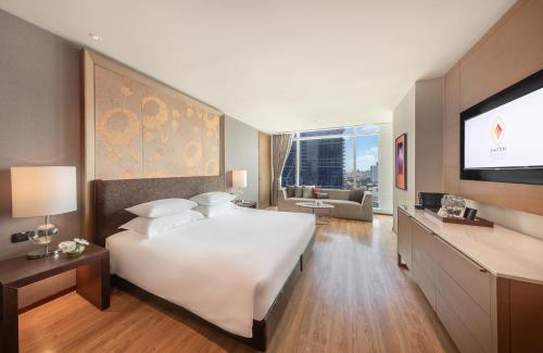 Habitación Deluxe Grand Executive con acceso al salón del hotel Eastin Grand Sathorn Bangkok. Foto 2