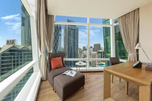 Habitación Deluxe Grand Executive con acceso al salón del hotel Eastin Grand Sathorn Bangkok. Foto 4