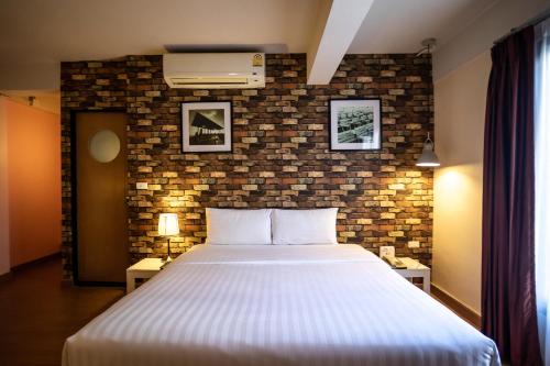 Habitación Superior con 1 cama king - size del hotel Ibis Styles Chiang Mai. Foto 1