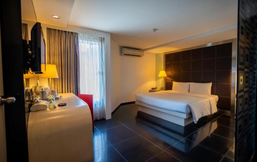 Habitación Superior con 1 cama king - size del hotel Ibis Styles Chiang Mai. Foto 6