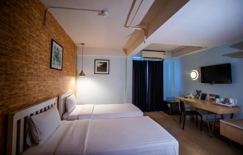Habitación Familiar del hotel Ibis Styles Chiang Mai. Foto 1